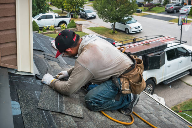 Professional Roofing technician working in Hungerford, TX